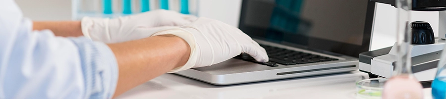 Health professional doing research on laptop