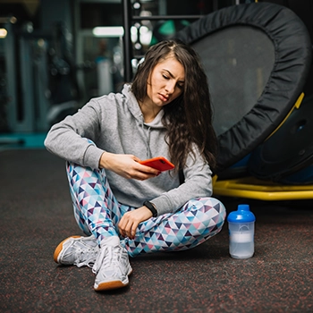 Woman taking a rest after finishing her workout