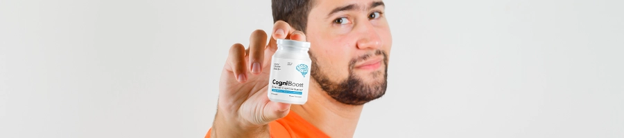 Holdign a supplement container of CogniBoost showing to the viewer