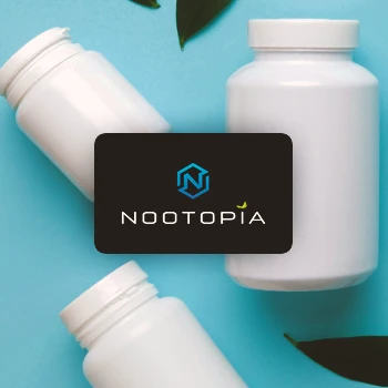 Nootopia logo with pill bottles in the background