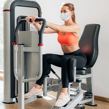 Using a hip abduction machine