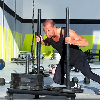 Sled push in side gym