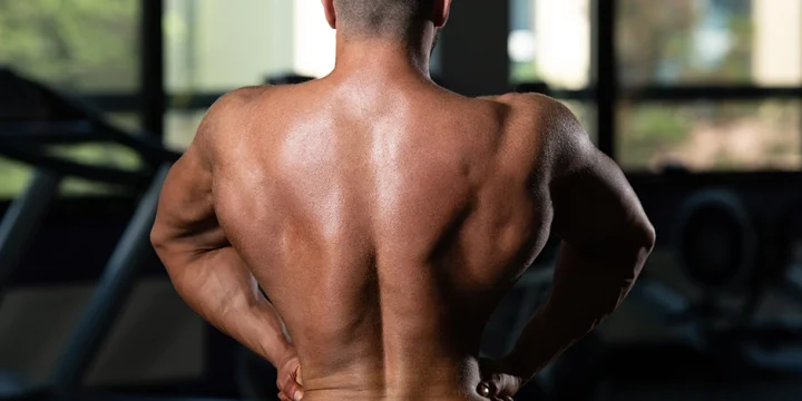 Showing wide back muscles