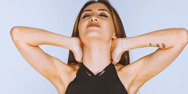 A woman stretching out her Levator Scapulae Neck