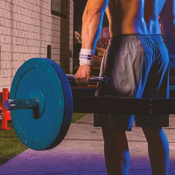 A person doing a trap bar deadlift