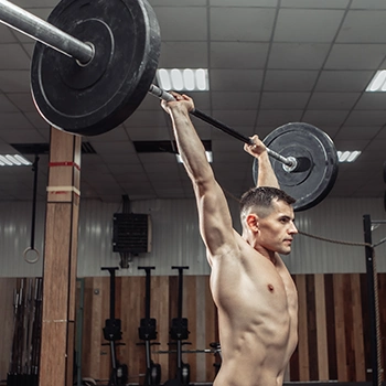 Lifting a barbell land doing overhead press