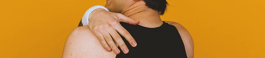 A man doing levator scapulae stretch