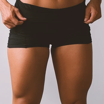 Close up shot of leg muscles of a buff woman