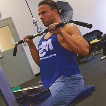 A person doing a close grip lat pulldown with bowflex equipment