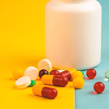Close up shot of supplement pills on a table