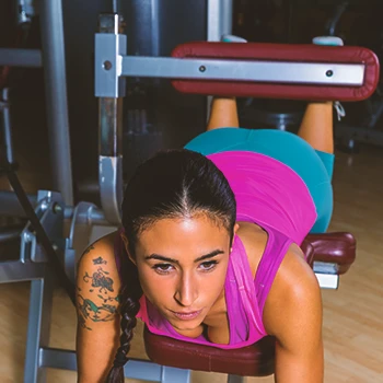 A woman doing a hamstring curl