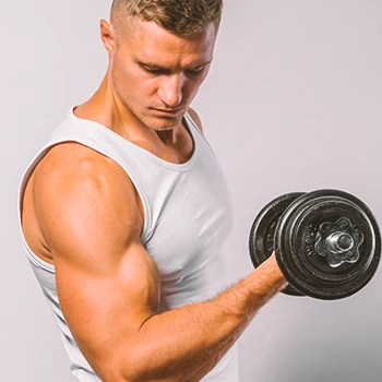 A person in the gym doing bicep curls