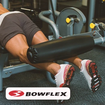 A person doing leg curls with bowflex workout