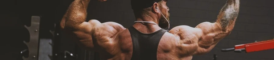 Seth Feroce shows his back muscles result of his workout plan and diet.