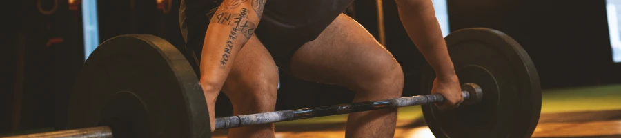 A person lifting weights in the gym