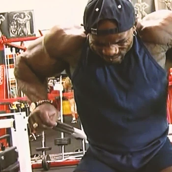 Flex Wheeler in the gym doing back workout