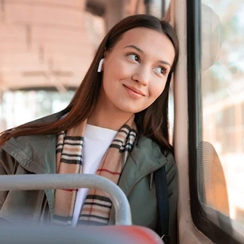 Smiling woman in a bus