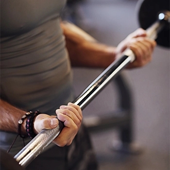 Performing barbell curls