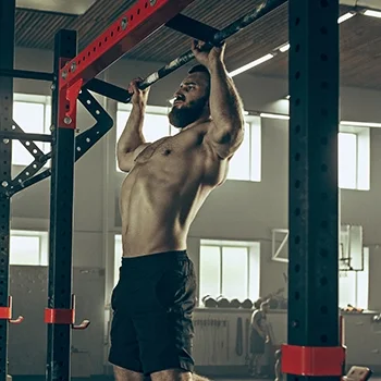 Doing chin-ups in gym