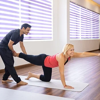 Woman doing bird dog pose