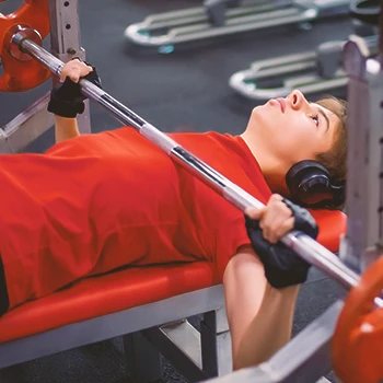 A teenager doing bench presses