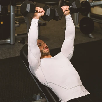 A person doing chest fly dumbbell workouts