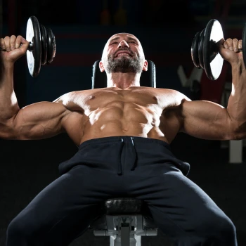 Man doing incline dumbbell presses