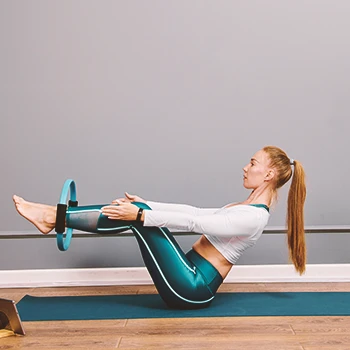 A person working out her core at home
