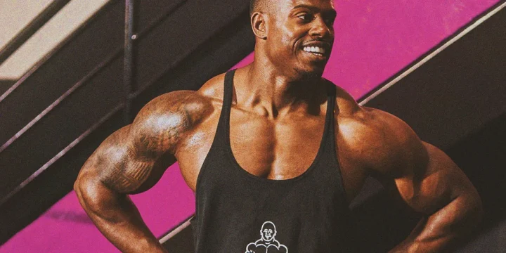 Simeon Panda flexing his arm muscles gained from workout