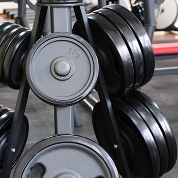 A rack of weight plates with different weights