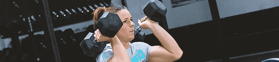 A person doing dumbbell front squat variations