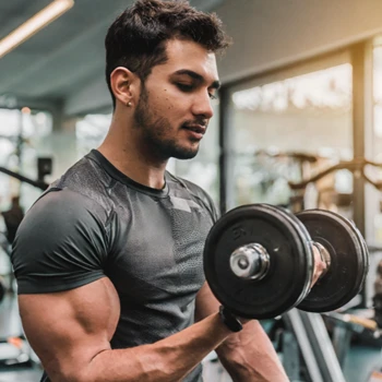 Man working out with dumbbells for biceps