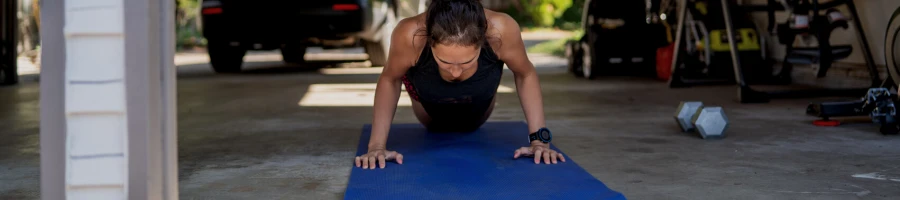 A woman working out in the garage