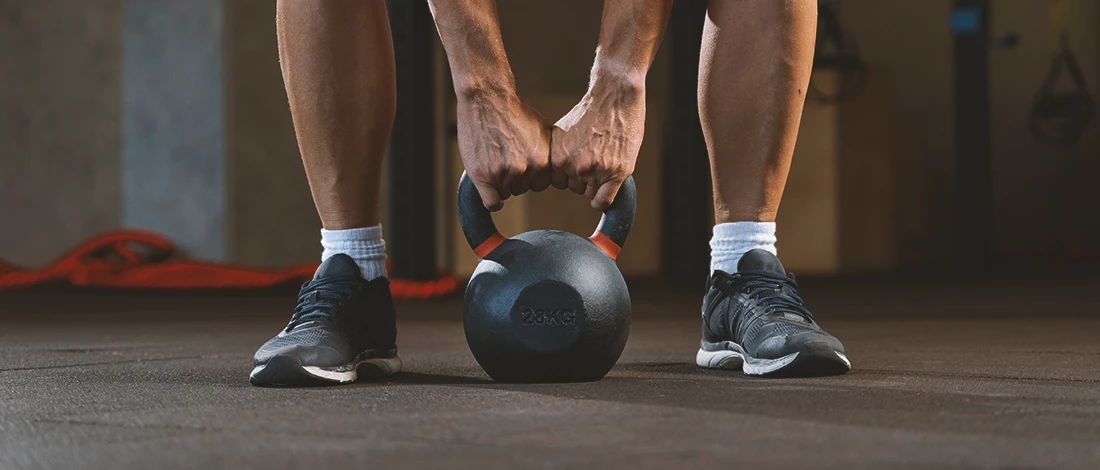 Kettlebell Squats: Proper Form & How-To