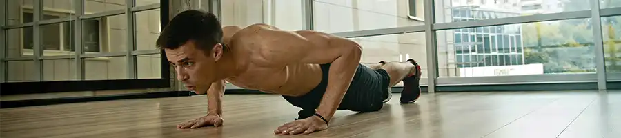 a picture of a man doing push up