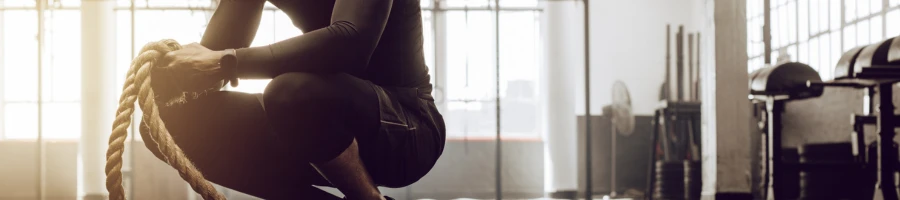 Man working out with ropes