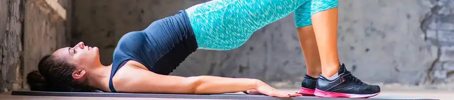 a picture of a woman doing a lower back workout