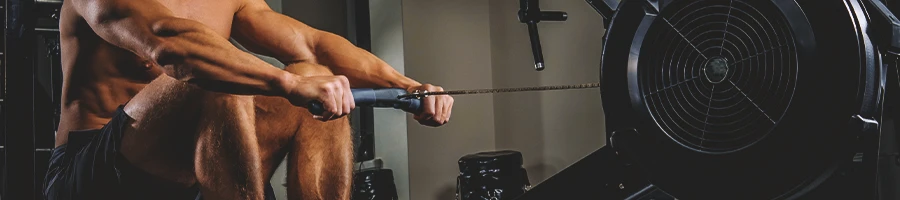 A person doing intense rowing workouts