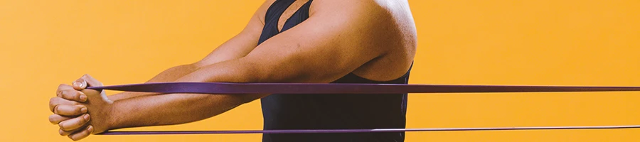 A person working out with a resistance band