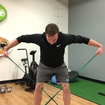 A man doing a bent-over rear delt fly