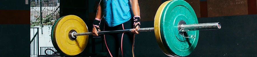 A woman doing deadlifts