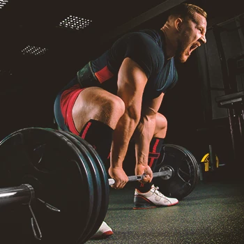 A person weightlifting at the gym