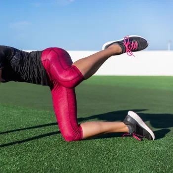 Person performing a fire hydrant exercise