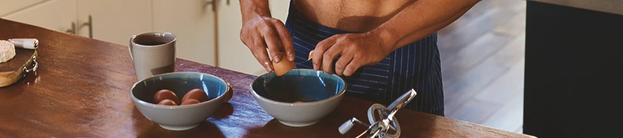 A person preparing breakfast for muscle growth