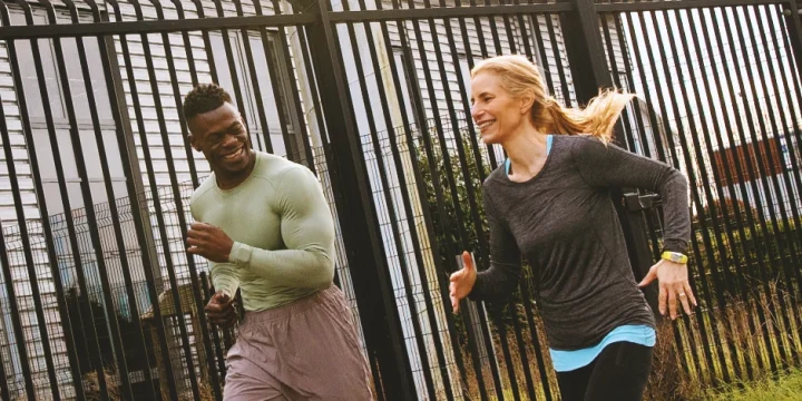 A couple doing HIIT and Cardio workouts outside