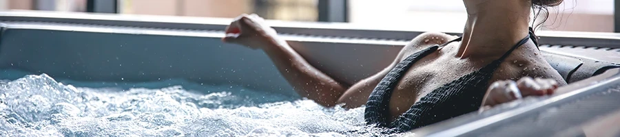 A woman enjoying ice bath benefits