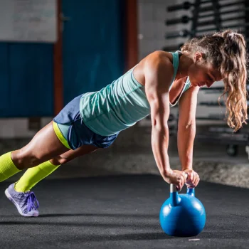 Person doing HIIT Kettlebell workouts
