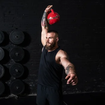 Person doing HIIT Kettlebell snatch workouts