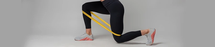 A woman doing resistance band workout routine