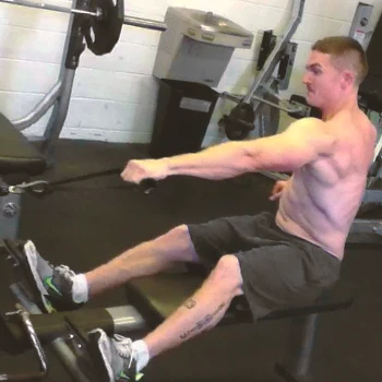A person doing Seated Twisting Cable Rows at the gym